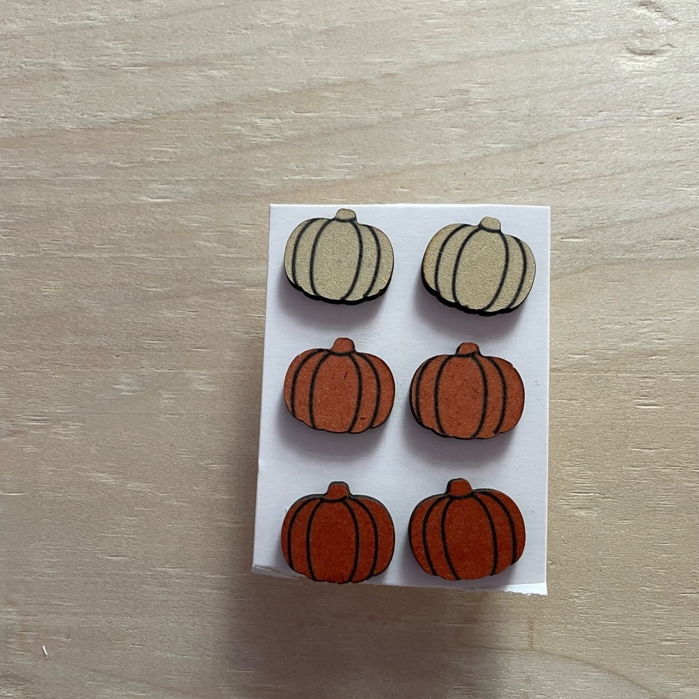 Three sets of pumpkin earrings